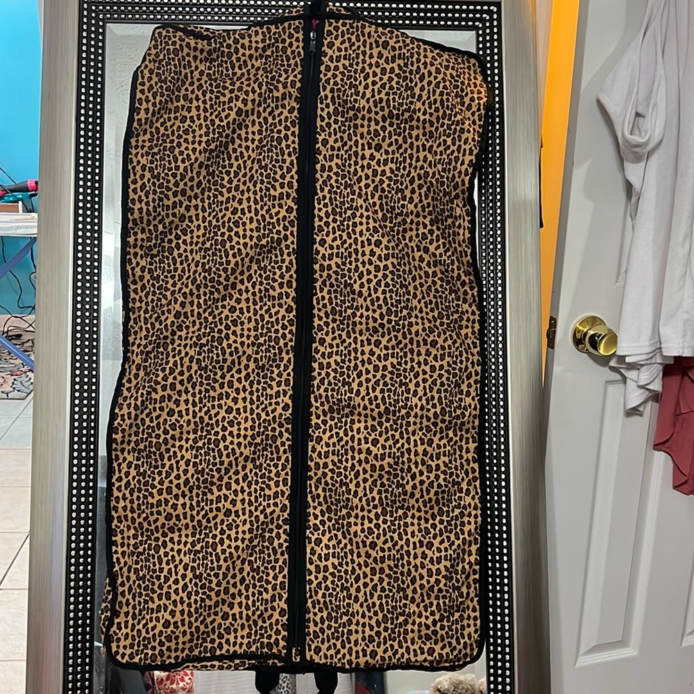 ANIMAL PRINT GARMENT HOLDER 39” x 22”